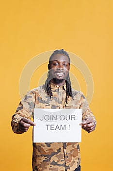 Hr recruiter holding job offer sign