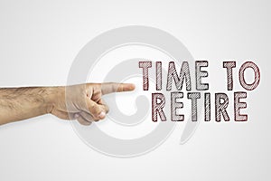 HR, retirement, compulsory retirement concept. Hand pointing outdoors next to the text: time to retire.