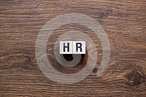 HR - word concept on building blocks, text