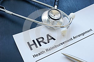 HRA health reimbursement arrangement application and stethoscope.