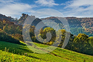 Hrad Sasov castle ruins near Hron river during autumn