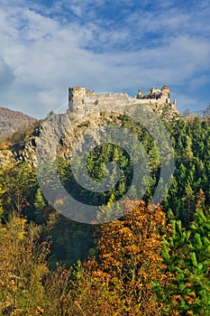 Hrad Sasov castle ruins near Hron river during autumn