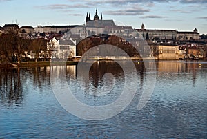 Hradcany with Prague Castle and Vltava river from Slovansky ostrov isle in Prague
