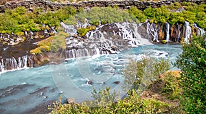 Hraunfoss waterfalls in summer season, Iceland