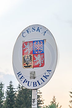 Coat of arms of the Czech Republic Czech: Statni znak Ceske republiky on the border with Poland photo