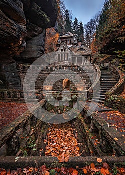 Hresko, Czech Republic - Lovely curvy stone steps and stone cottage in the Czech woods near Hresko at autumn