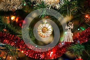 ÃÂ¡hristmas ball in shape of sunflower on Christmas tree. photo