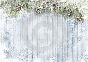 Ð¡hristmas card. Wooden background with snow firtree, cones and red berry. Season`s greetings