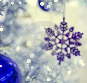 Ð¡hristmas silver tree with decorations snowflake