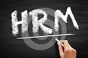 HRM - Human Resource Management is the strategic approach to the effective and efficient management of people in a company or photo