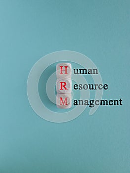 HRM, Human resource management symbol. Red words HRM