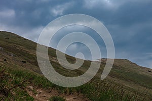 Hromove pass, national park Mala Fatra, Slovakia, spring cloudy day. Path to cottage under Chleb