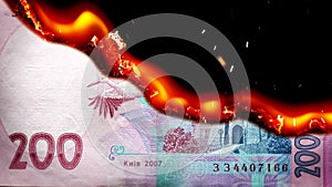 Hryvnia bill Ukrainian money burning in flames