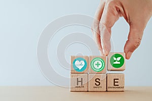 HSE Health Safety Environment concept. Environmental management, health protection and safety by planning, implementing,