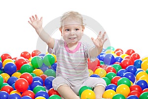 Hsppy boy playing colorful balls