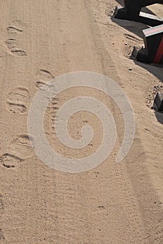 Footprints in the Sand - Border Wall between United States and Mexico photo