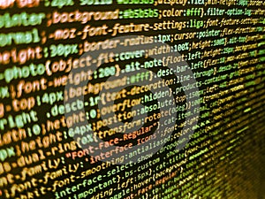 HTML code on lcd screen. Modern web development background. Shallow depth of field, selective focus effect. Internet connection