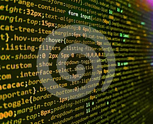 HTML CSS3 source code on lcd screen with black background. Programming code abstract screen of software developer. Modern