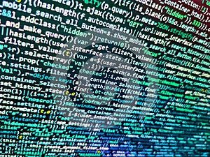 HTML CSS3 source code on lcd screen with black background. Programming code abstract background screen of software. Programming
