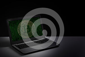 HTML web code and bitcoin on Computer Monitor - Cyber crime digital