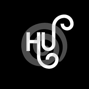 HU letter logo design on black background. HU creative initials letter logo concept. hu letter design. HU white letter design on