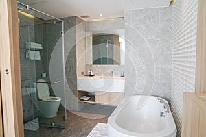 Hua Hin Thailand - February 14 2021: close up bathtub and modern bathroom interiors in hotel bedroom