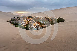 Huacachina from the dunnes at sunrise