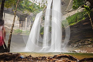 Huai Luang Waterfall, also known as Namtok Huai Luang or Namtok Bak Teo. The waterfall is plunging down three steps from an elevat