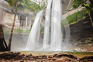 Huai Luang Waterfall, also known as Namtok Huai Luang or Namtok Bak Teo. The waterfall is plunging down three steps from an elevat