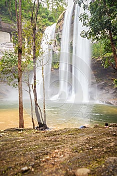 Huai Luang Waterfall, also known as Namtok Huai Luang or Namtok Bak Teo. The waterfall is plunging down three steps from an elevat