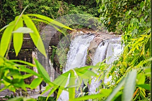 Huai Luang Waterfall, also known as Namtok Huai Luang or Namtok Bak Teo. The waterfall is plunging down three steps from an elevat