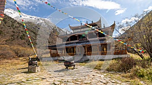 Huanglong Middle Temple , with multi-color flags in Huanglong, China