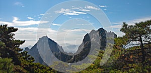 Huangshan Mountain in Anhui Province, China. View of Lotus Peak on right and Celestial Capital Peak on left from Bright Top