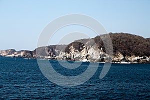 Huatulco bay with blue ocean