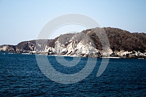 Huatulco bay with blue ocean