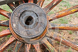 HUB OF OLD DETERIORATING OX WAGON WHEEL