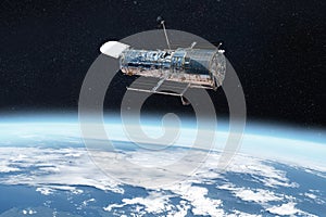 The Hubble space telescope on orbit of Earth planet. Space observatory research.