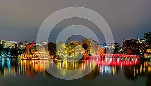 The Huc Bridge leading to the Temple of the Jade Mountain on Hoan Kiem Lake in Hanoi, Vietnam