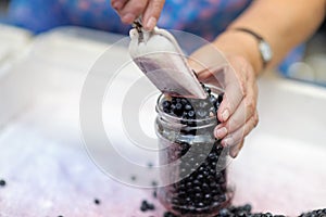 Huckleberry in glass jar