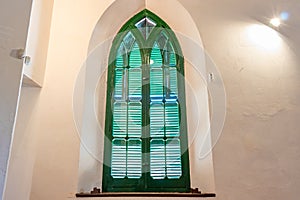 Huelva, Spain - December 18, 2021: Detail of window of Anglican Church of Bella Vista used by the staff of the Rio Tinto Company