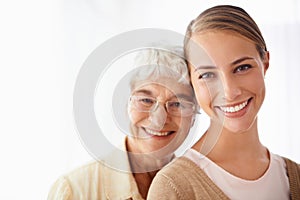 Hug, white background and portrait of senior mother with daughter embrace for bonding, relationship and love. Family