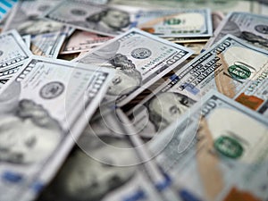 Huge amount of US bucks lying down at table