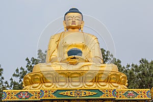 Huge ancient golden statue of buddha in the temple in Kathmandu