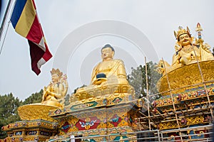 Huge ancient golden statues of buddha in the temple in Kathmandu