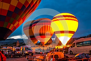 Huge balloons inflate before launch. Turkey. Cappadocia