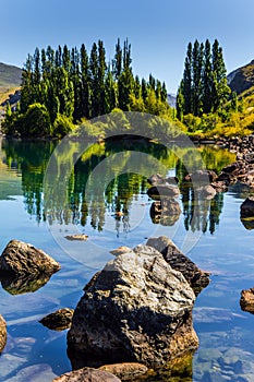 Huge basalt boulders and cypress alley