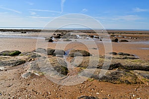 Huge beach with rocks after the sea tide