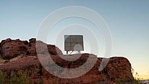 Huge billboard on the red sandy mountain in St, George city, Utah