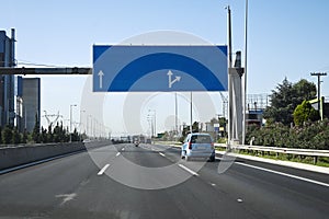 Blank road sign over highway