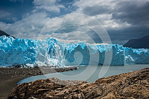 A huge blue glacier near the bay. Shevelev.